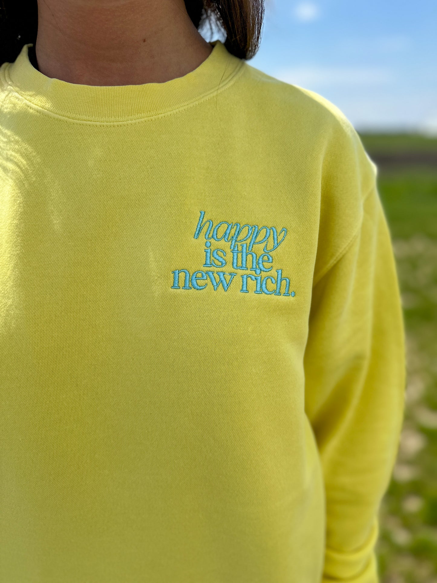 Happy is the New Rich Sweatshirt